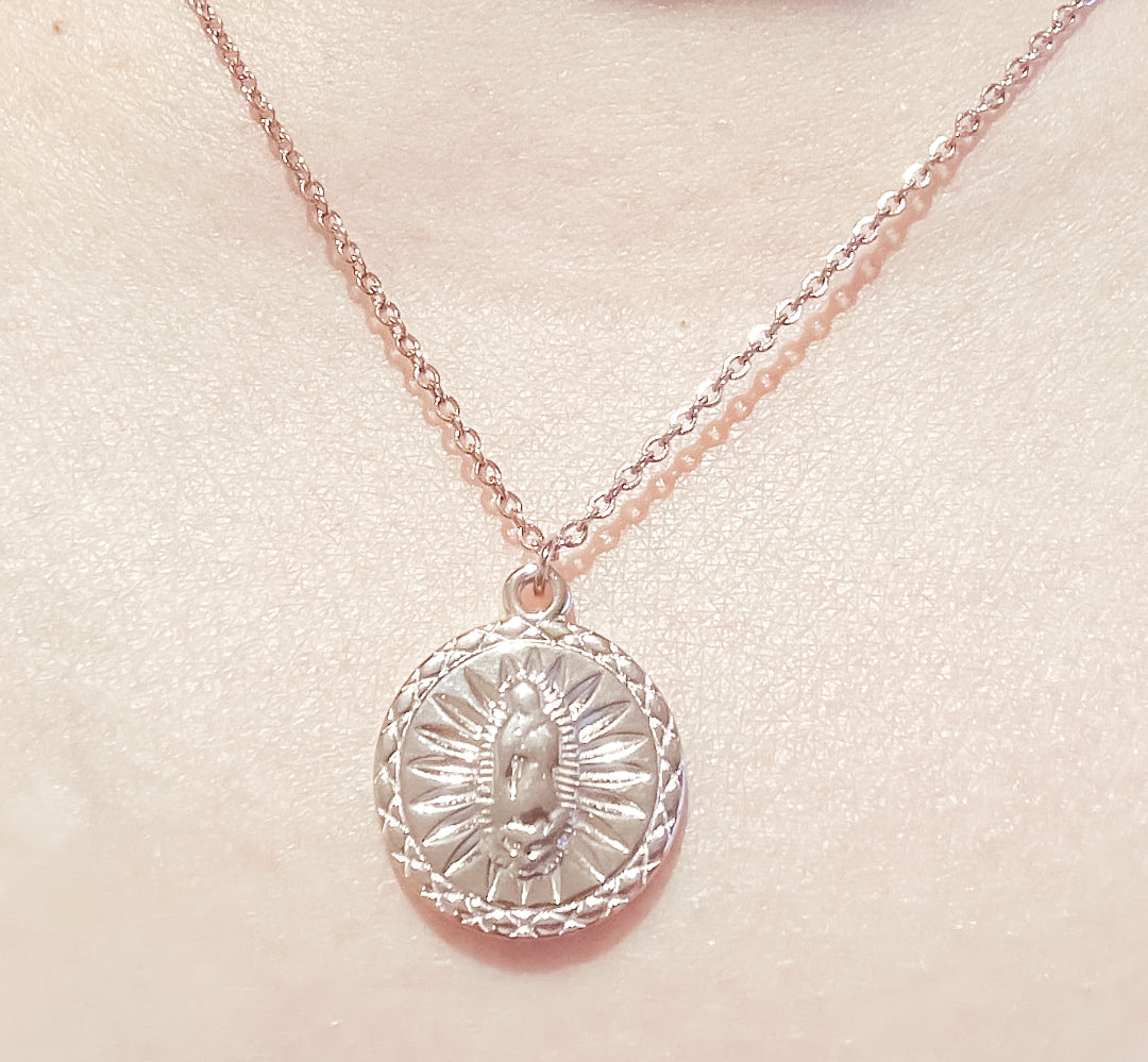Dainty rose gold pendant necklace with a round charm