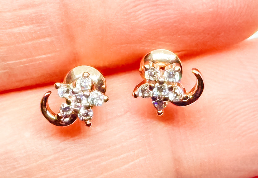 Close-up of minimalist rose gold hoop earrings